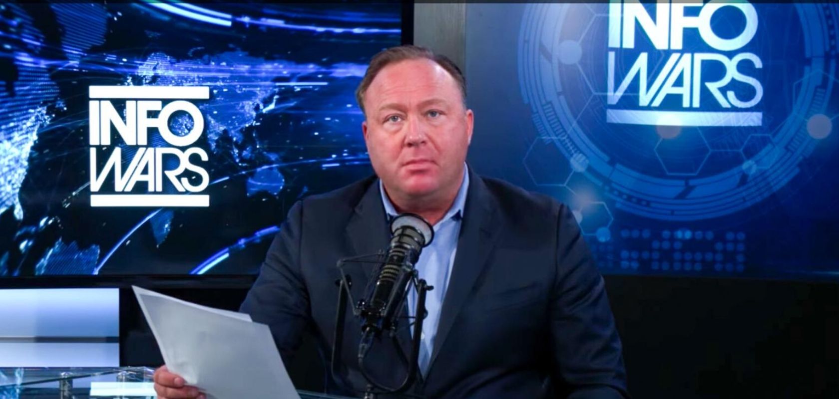 Newsweek says it flagged YouTube channels that contained content from rival media outlet, Infowars