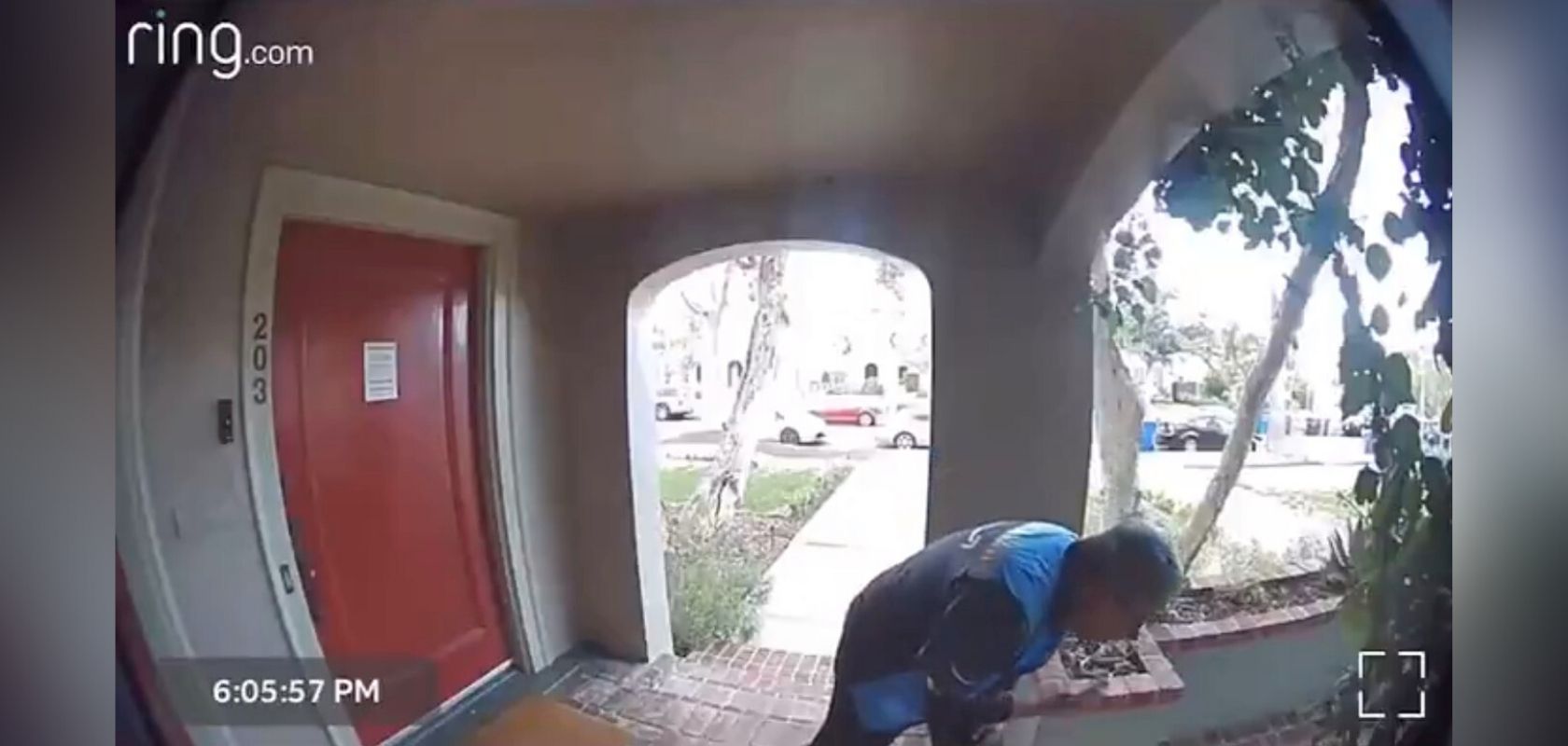 Courier delivering Amazon package caught purposefully wiping saliva on package