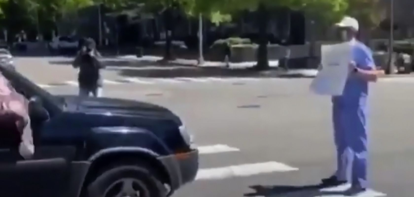 Media caught on video staging “healthcare worker” vs protestors photos