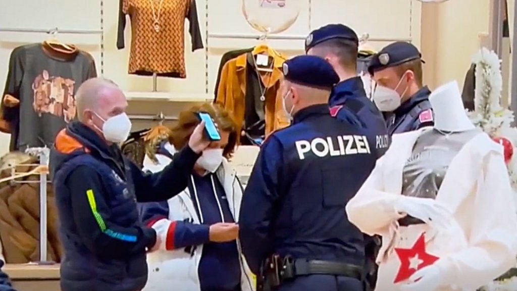 Austrian police check shoppers for vaccine passports