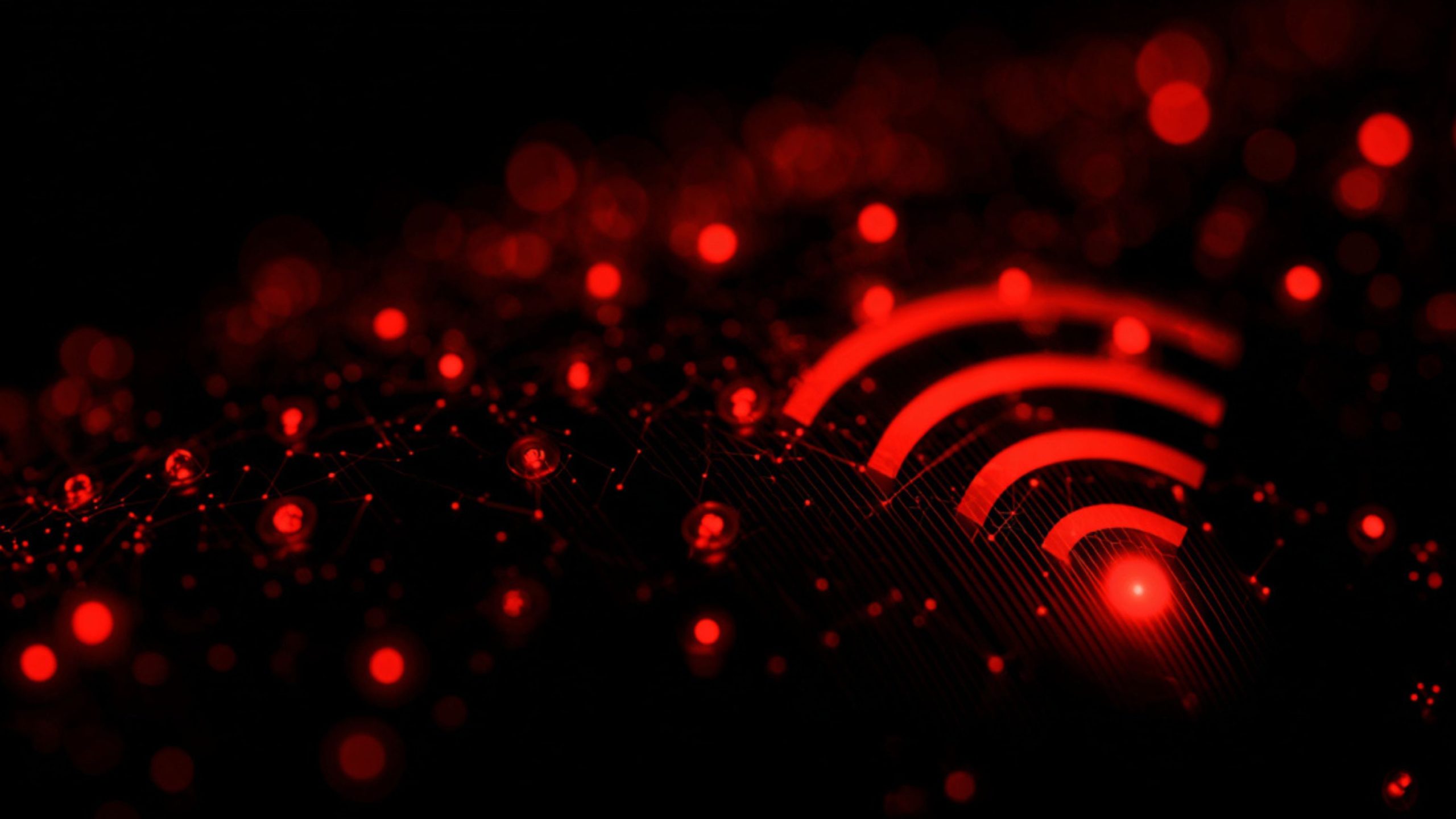 Glowing red Wi‑Fi symbol formed by concentric arcs and a bright central dot against a dark abstract network of connected red nodes and bokeh lights.