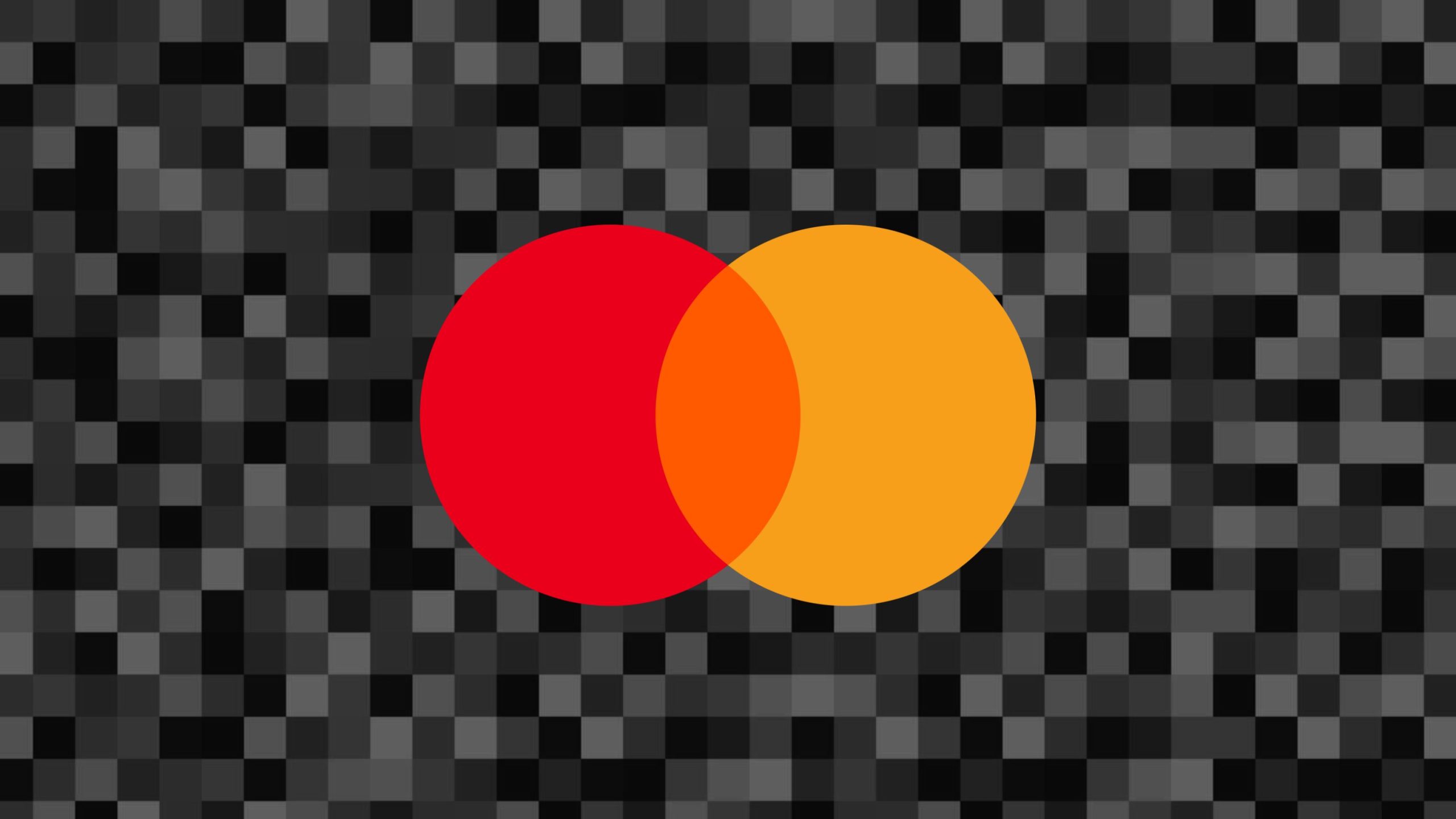 Two overlapping circles, red on the left and orange on the right, forming an intersection in the center against a black and dark gray pixelated background