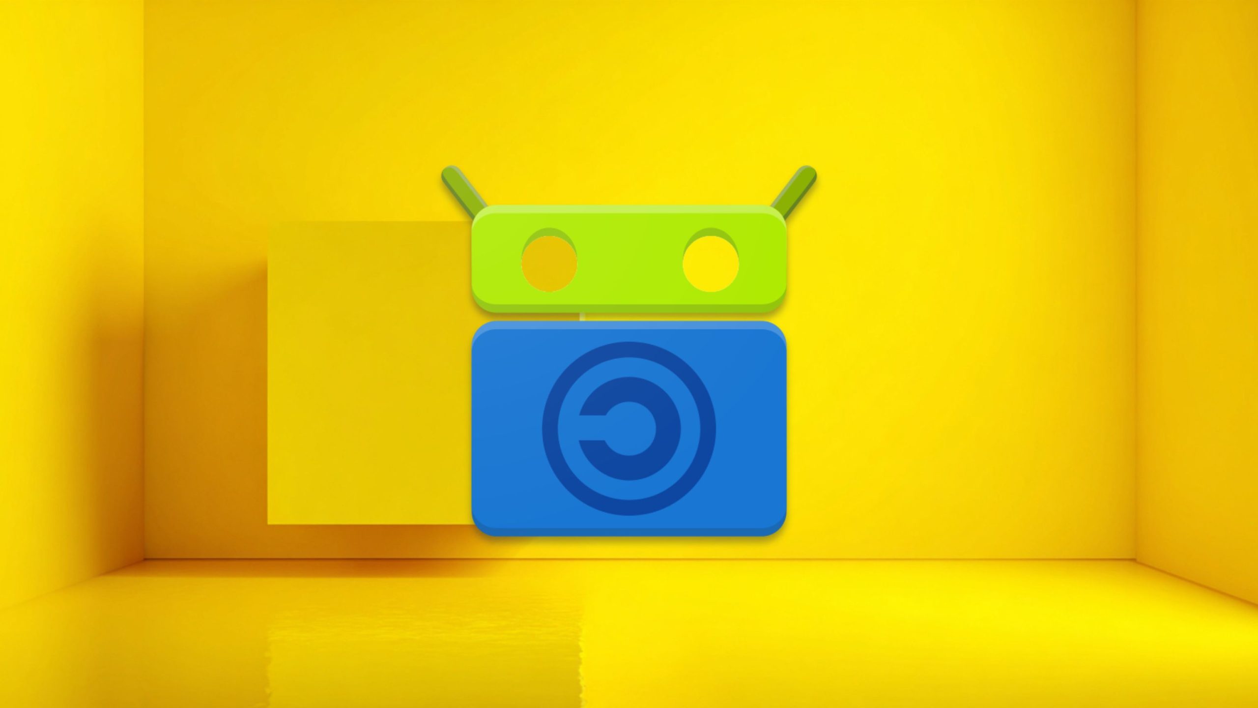 F-Droid Icon. A green rounded-rectangle head with two short antennae and circular eye holes above a blue rounded-rectangle body bearing a dark circular 'C' emblem.