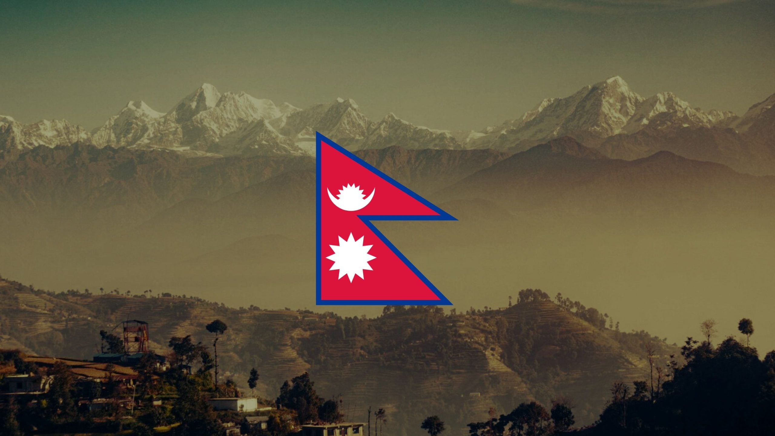 Red, blue-edged double-pennon flag of Nepal with white stylized moon and sun centered over a hazy landscape of terraced hills and distant snow-capped Himalayan peaks.