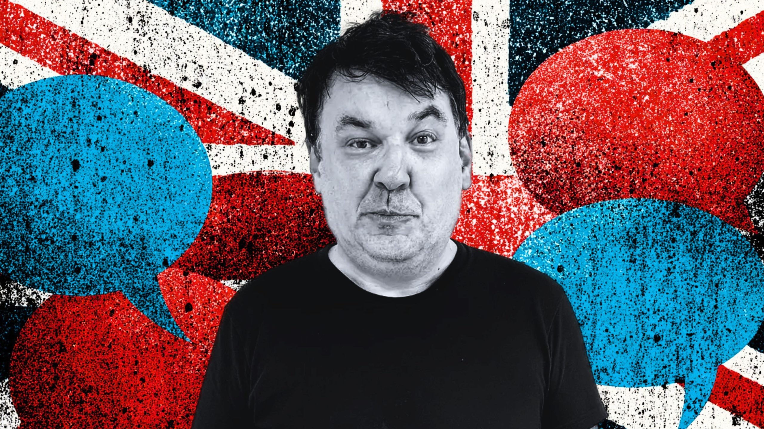 Linehan with dark hair and a quizzical expression in a black T-shirt centered in front of a graffiti-style red, white and blue background with oversized blue and red speech bubbles and a distressed Union Jack pattern.