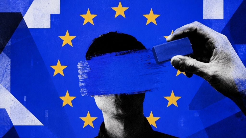 Silhouette of a person with eyes erased by a blue brushstroke against a European Union flag of yellow stars.