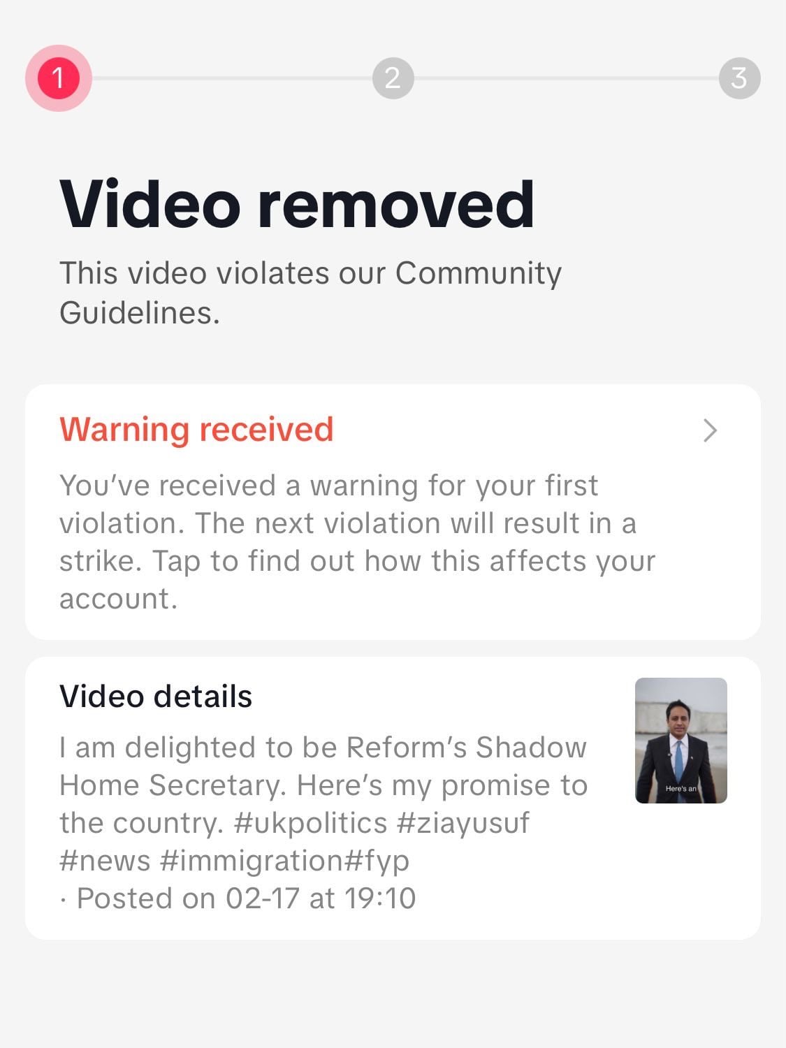 Bold headline "Video removed" with message saying the video violates Community Guidelines, a red "Warning received" box explaining a first-violation warning, and a "Video details" card with a short political caption and small thumbnail.